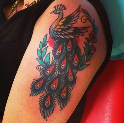 18 Radiant Traditional Peacock Tattoos | Tattoodo